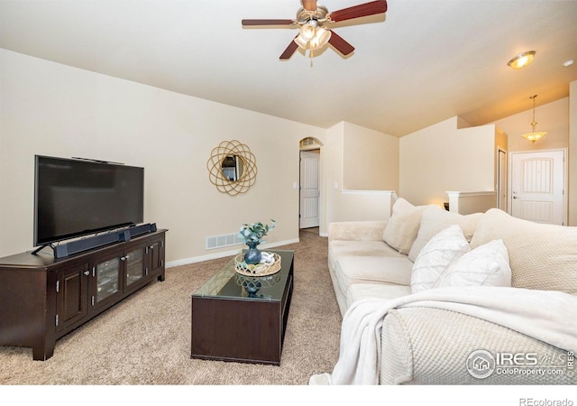 6659 12th St, Frederick, CO 80530 - living area featuring ceiling fan, carpet floors, arched walkways, lofted ceiling, and visible vents