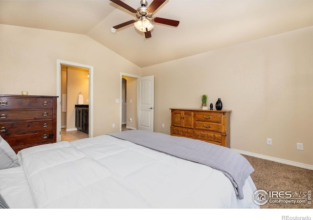 6659 12th St, Frederick, CO 80530 - carpeted bedroom featuring baseboards, ensuite bathroom, ceiling fan, and lofted ceiling