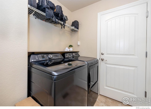 6659 12th St, Frederick, CO 80530 - washroom with laundry area and washing machine and dryer