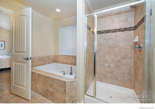 6659 12th St, Frederick, CO 80530 - bathroom featuring a garden tub, tile patterned flooring, ensuite bathroom, recessed lighting, and a stall shower