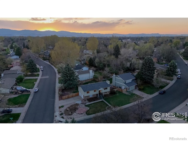 drone / aerial view featuring a mountain view