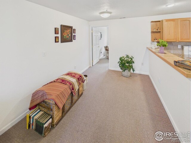 5425 County Road 32 Unit 15, Mead, CO 80504 - sitting room featuring light carpet and baseboards