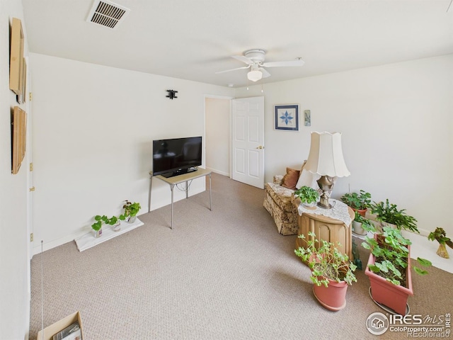 5425 County Road 32 Unit 15, Mead, CO 80504 - carpeted living area with a ceiling fan and baseboards