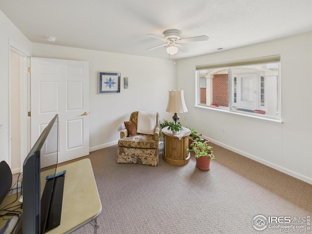 5425 County Road 32 Unit 15, Mead, CO 80504 - sitting room featuring carpet, baseboards, and ceiling fan