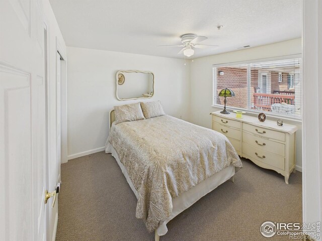 5425 County Road 32 Unit 15, Mead, CO 80504 - carpeted bedroom with baseboards and ceiling fan
