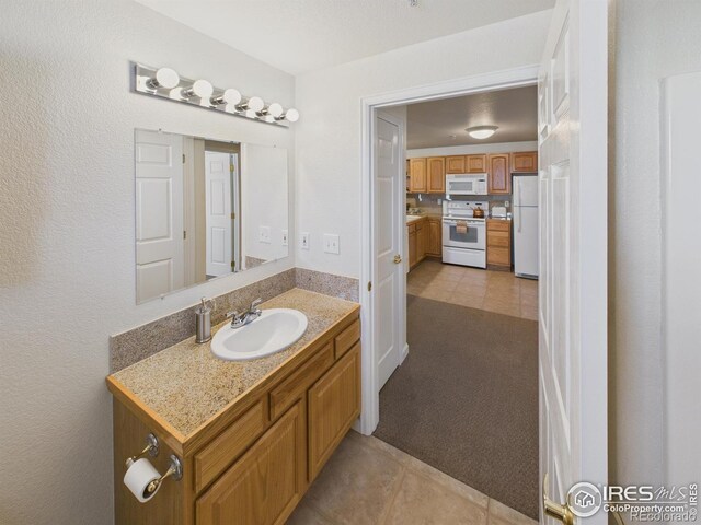 5425 County Road 32 Unit 15, Mead, CO 80504 - bathroom featuring tile patterned floors and vanity