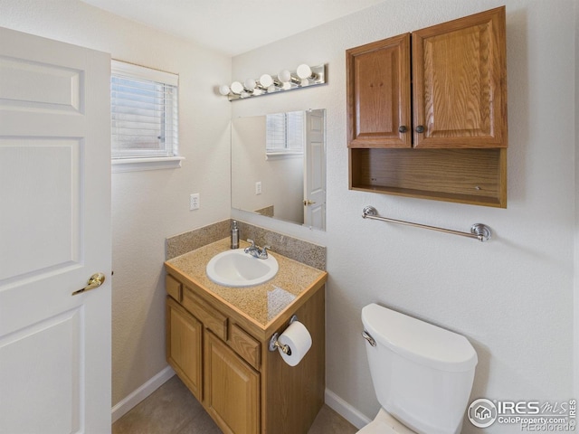 5425 County Road 32 Unit 15, Mead, CO 80504 - bathroom with healthy amount of natural light, vanity, and toilet