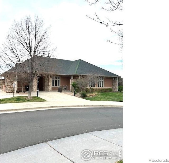13873 Legend Way Unit 103, Broomfield, CO 80023 - ranch-style house featuring concrete driveway