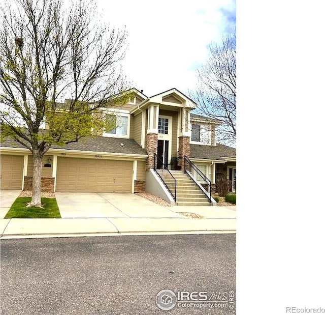 13873 Legend Way Unit 103, Broomfield, CO 80023 - view of front of house featuring driveway