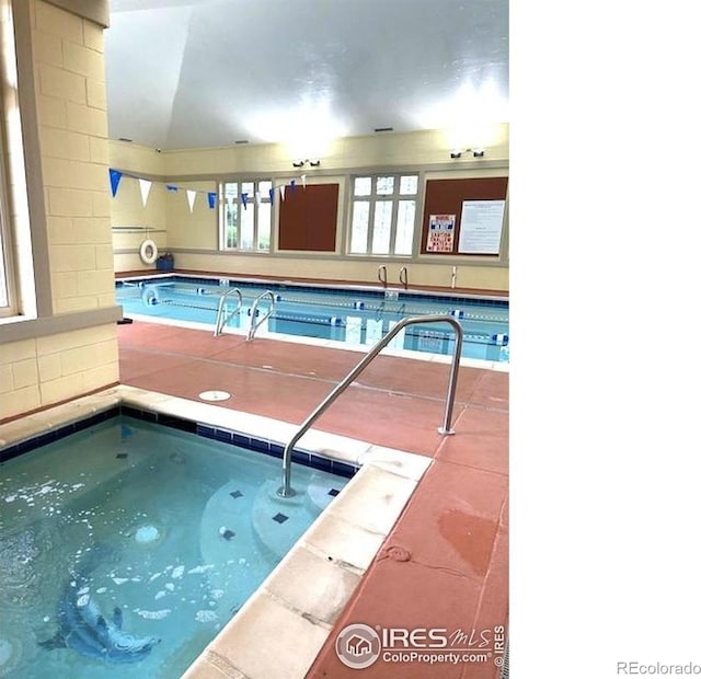 13873 Legend Way Unit 103, Broomfield, CO 80023 - indoor pool featuring a hot tub