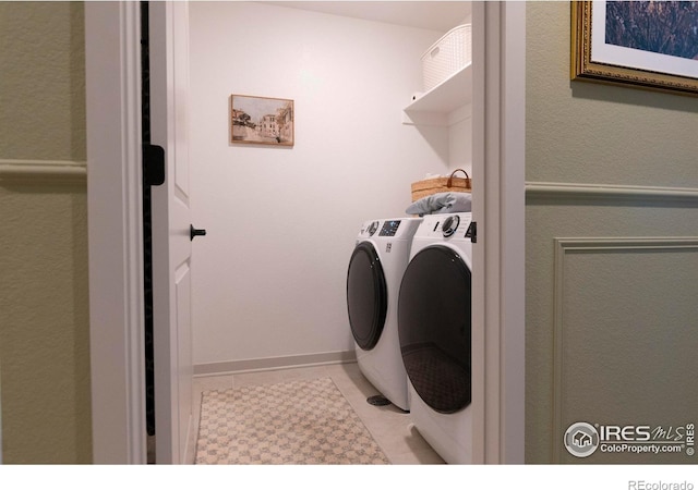 4424 Haymill Ct, Timnath, CO 80547 - washroom featuring independent washer and dryer and light tile patterned flooring