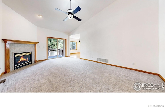 711 Eagle Ln, Estes Park, CO 80517 - unfurnished living room with visible vents, a tiled fireplace, baseboards, ceiling fan with notable chandelier, and carpet flooring
