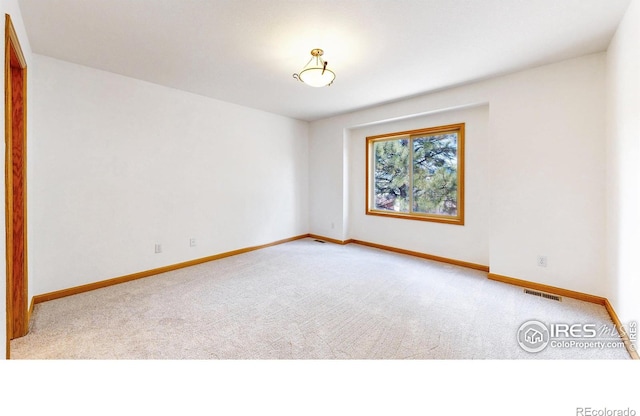711 Eagle Ln, Estes Park, CO 80517 - carpeted spare room featuring baseboards and visible vents