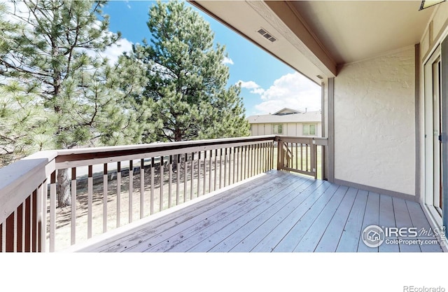 711 Eagle Ln, Estes Park, CO 80517 - wooden deck featuring visible vents