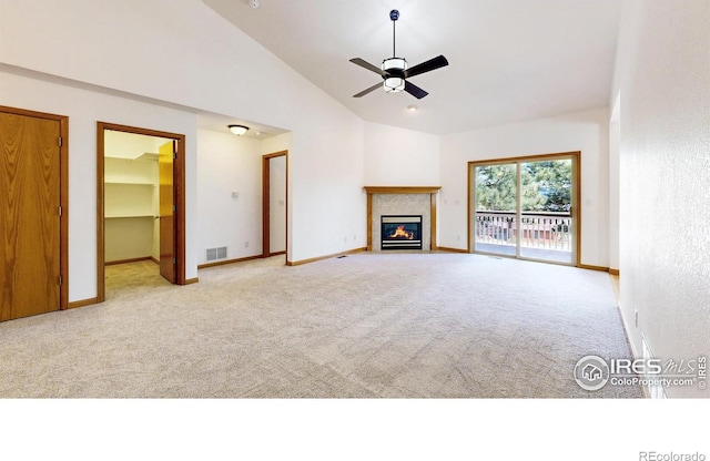 711 Eagle Ln, Estes Park, CO 80517 - unfurnished living room featuring visible vents, baseboards, ceiling fan, carpet, and vaulted ceiling