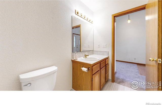 711 Eagle Ln, Estes Park, CO 80517 - half bath with toilet and vanity