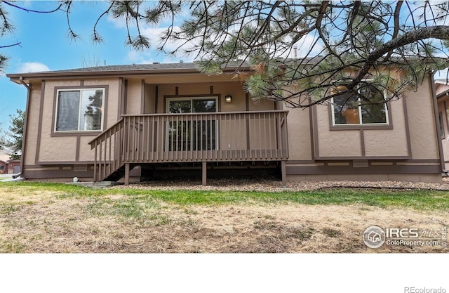 711 Eagle Ln, Estes Park, CO 80517 - back of property with stucco siding