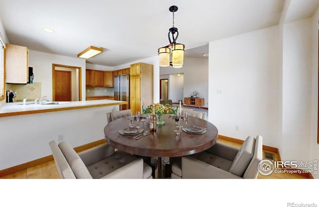 711 Eagle Ln, Estes Park, CO 80517 - dining space featuring recessed lighting, baseboards, and light wood-type flooring
