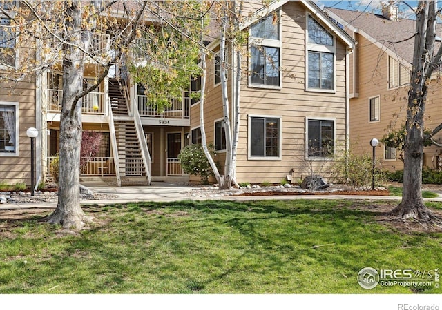 5934 Gunbarrel Ave Unit D, Boulder, CO 80301 - view of front of home with stairs and a front lawn