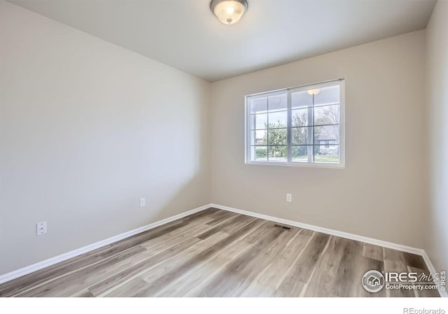 8301 W 18th Street Rd, Greeley, CO 80634 - unfurnished room featuring baseboards and wood finished floors