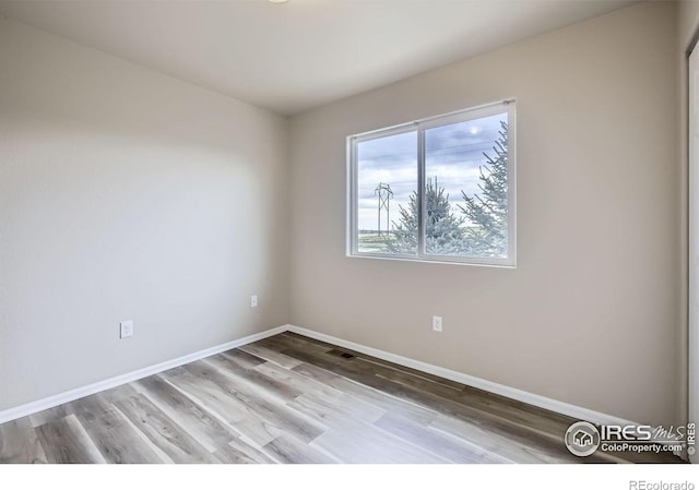 8301 W 18th Street Rd, Greeley, CO 80634 - unfurnished room with baseboards and wood finished floors