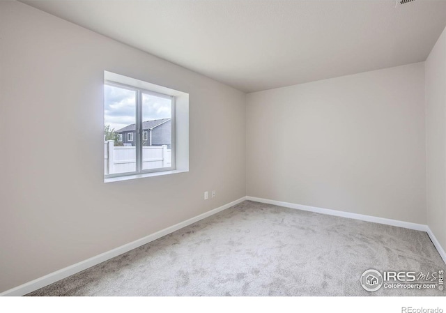 8301 W 18th Street Rd, Greeley, CO 80634 - unfurnished room with carpet floors and baseboards