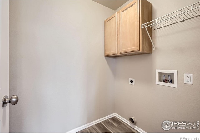 8301 W 18th Street Rd, Greeley, CO 80634 - laundry room with cabinet space, hookup for a washing machine, dark wood-type flooring, baseboards, and hookup for an electric dryer
