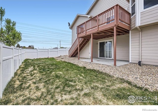 8301 W 18th Street Rd, Greeley, CO 80634 - view of yard featuring a wooden deck, stairs, and a patio area