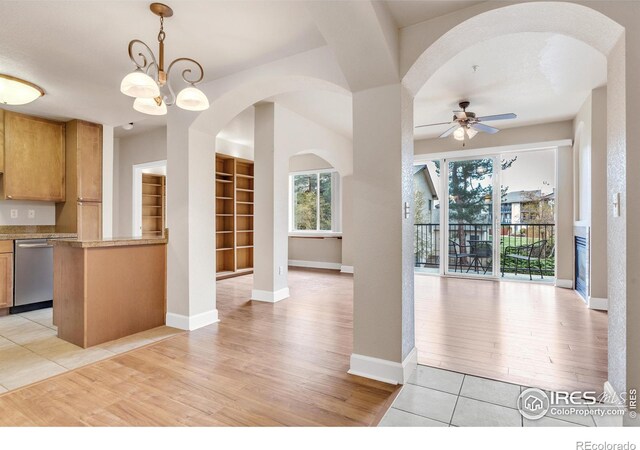 4500 Baseline Rd Unit 3203, Boulder, CO 80303 - kitchen with ceiling fan with notable chandelier, arched walkways, decorative light fixtures, dishwasher, and light wood-style floors