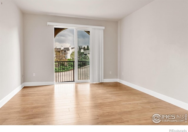 4500 Baseline Rd Unit 3203, Boulder, CO 80303 - unfurnished room with baseboards and light wood-style floors