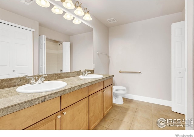 4500 Baseline Rd Unit 3203, Boulder, CO 80303 - bathroom with a sink, tile patterned flooring, double vanity, and visible vents