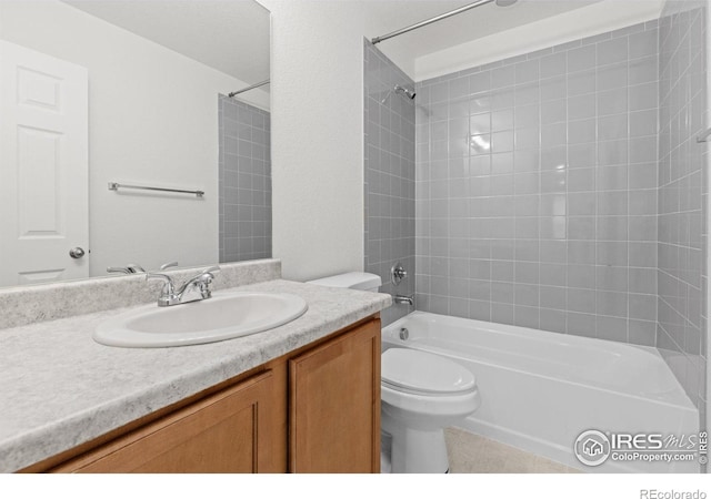 full bathroom with vanity, tile patterned floors, toilet, and bathing tub / shower combination