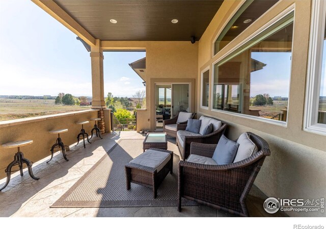 5751 Last Pointe Dr, Windsor, CO 80550 - view of patio featuring an outdoor hangout area