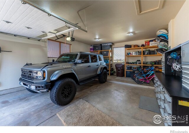 5751 Last Pointe Dr, Windsor, CO 80550 - garage featuring a garage door opener