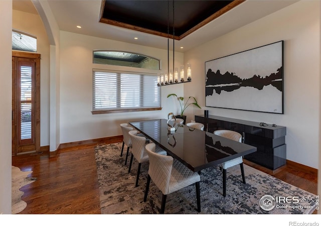 5751 Last Pointe Dr, Windsor, CO 80550 - dining space featuring baseboards, wood finished floors, healthy amount of natural light, and recessed lighting