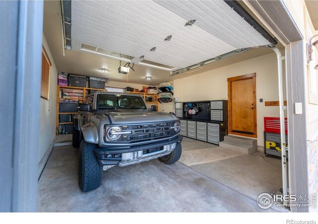 5751 Last Pointe Dr, Windsor, CO 80550 - garage with a garage door opener
