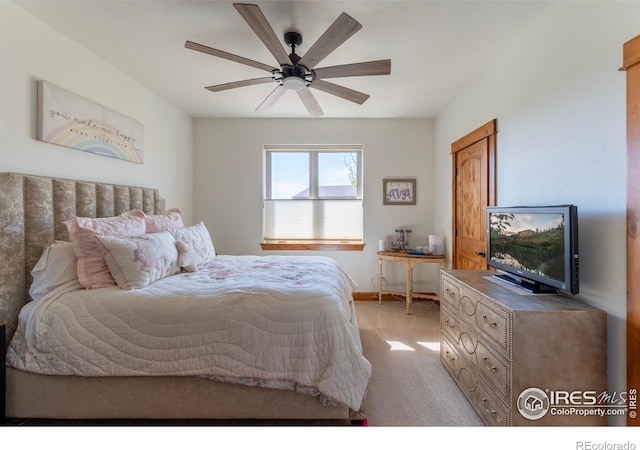 5751 Last Pointe Dr, Windsor, CO 80550 - bedroom featuring light colored carpet, baseboards, and a ceiling fan