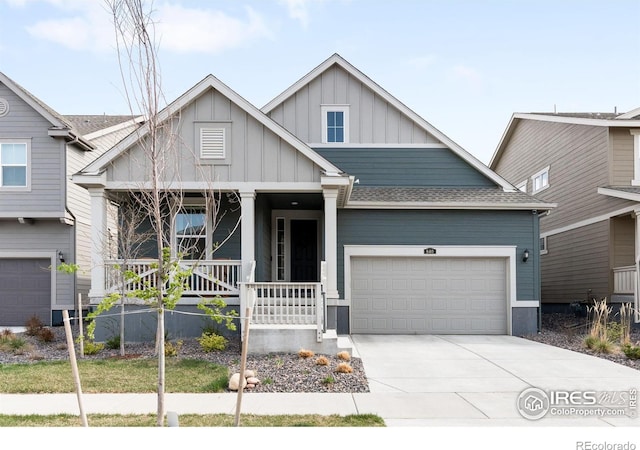840 Clover Loop, Lafayette, CO 80026 - craftsman house with an attached garage, board and batten siding, covered porch, and driveway