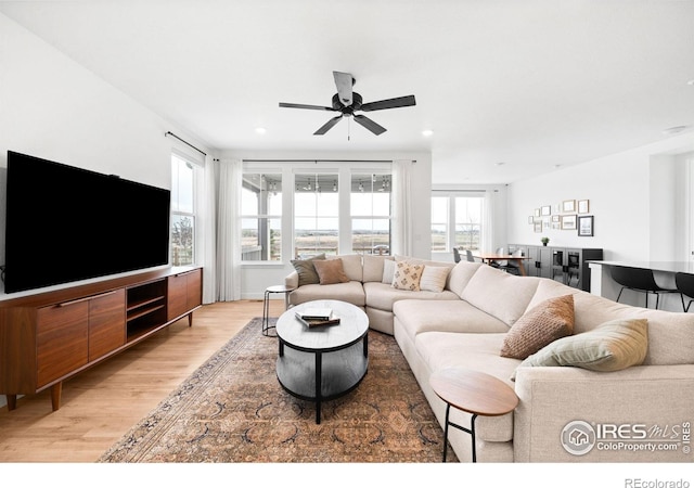 840 Clover Loop, Lafayette, CO 80026 - living area featuring light wood-style floors, ceiling fan, and recessed lighting
