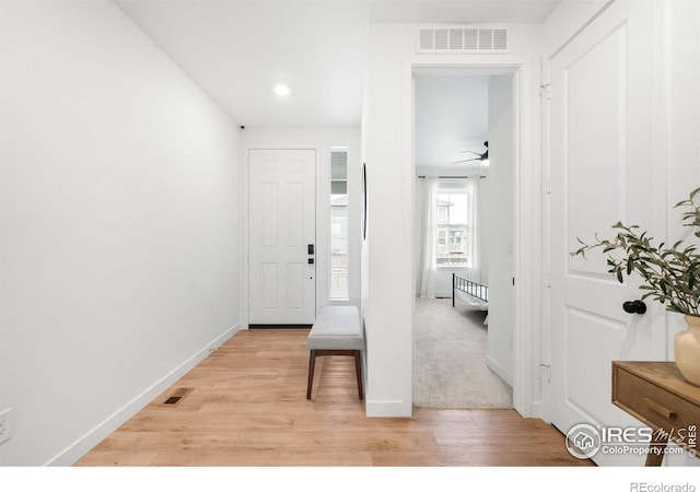 840 Clover Loop, Lafayette, CO 80026 - hallway featuring recessed lighting, baseboards, visible vents, and light wood-style floors