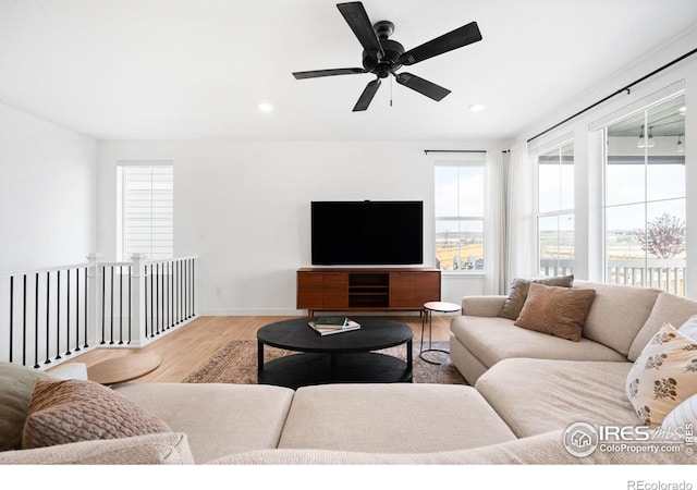 840 Clover Loop, Lafayette, CO 80026 - living room with baseboards, recessed lighting, ceiling fan, and wood finished floors