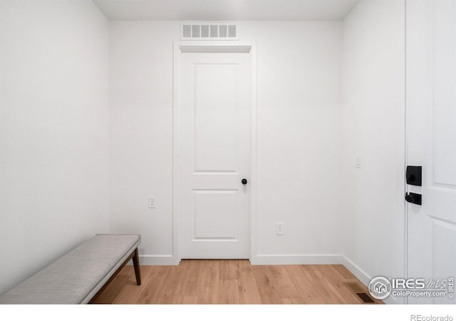 840 Clover Loop, Lafayette, CO 80026 - interior space featuring visible vents, light wood finished floors, and baseboards