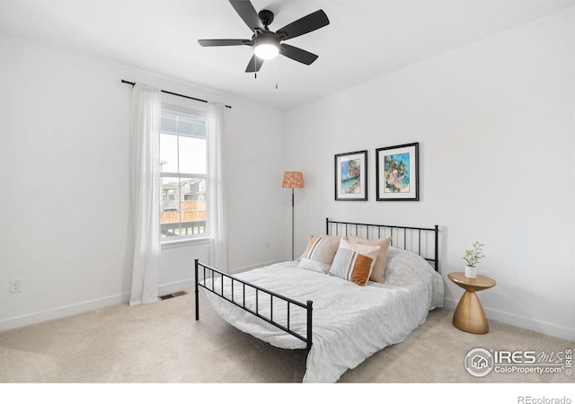 840 Clover Loop, Lafayette, CO 80026 - bedroom with carpet floors, a ceiling fan, baseboards, and visible vents