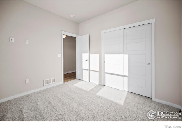 196 Bird Way, Lochbuie, CO 80603 - unfurnished bedroom featuring carpet flooring, baseboards, and a closet