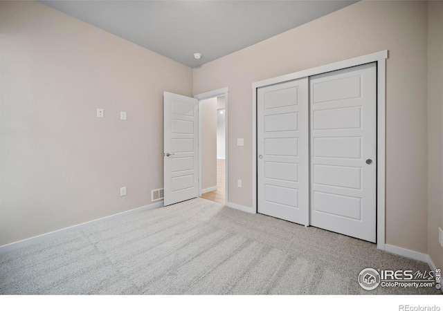 196 Bird Way, Lochbuie, CO 80603 - unfurnished bedroom featuring carpet flooring, baseboards, and a closet