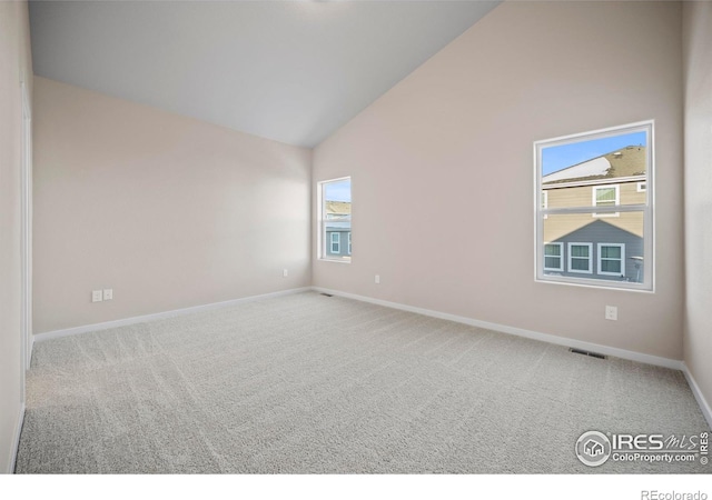 196 Bird Way, Lochbuie, CO 80603 - carpeted empty room featuring high vaulted ceiling and baseboards