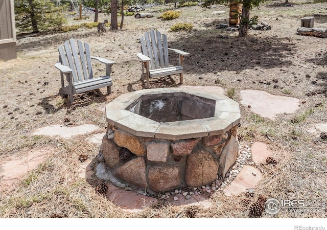 details featuring an outdoor fire pit