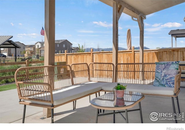 1312 Loraine Cir S, Lafayette, CO 80026 - view of patio / terrace featuring fence and a residential view