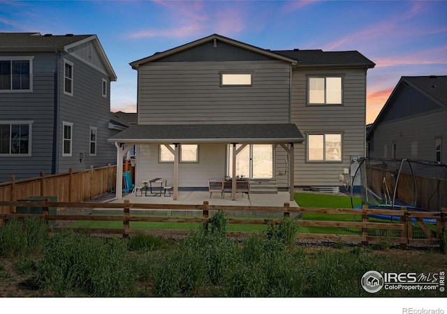 1312 Loraine Cir S, Lafayette, CO 80026 - back of property featuring a patio and fence private yard