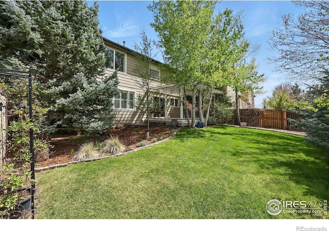 view of yard featuring fence